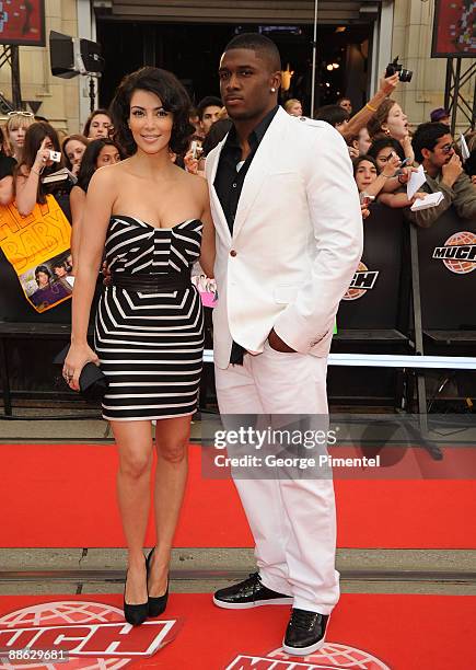 Kim Kardashian and Reggie Bush arrive on the red carpet of the 20th Annual MuchMusic Video Awards at the MuchMusic HQ on June 21, 2009 in Toronto,...