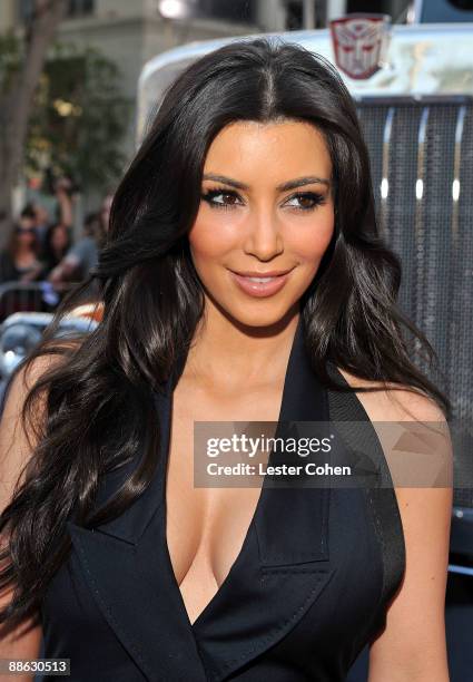 Personality Kim Kardashian arrives on the red carpet of the 2009 Los Angeles Film Festival's premiere of "Transformers: Revenge of the Fallen" held...