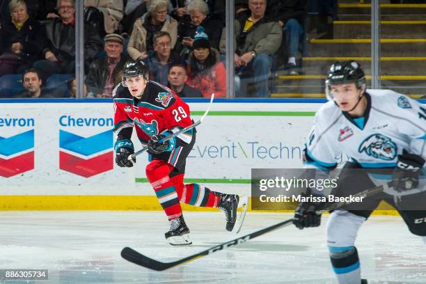 Nolan Foote of the Kelowna Rockets looks for the pass against the Kootenay Ice on December 2, 2017 at Prospera Place in Kelowna, British Columbia,...