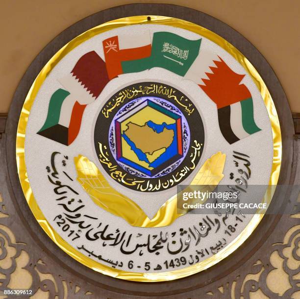 The logo of the Gulf Cooperation Council is pictured at the GCC summit in the Bayan palace in Kuwait City on December 5, 2017.The Gulf Cooperation...