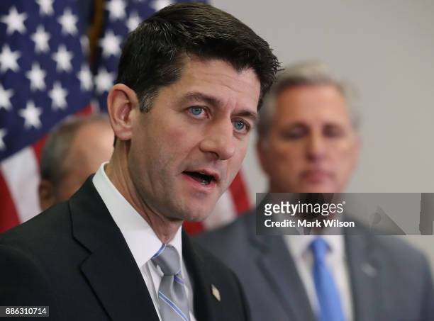House Speaker Paul Ryan speaks while flanked by House Majority Leader Kevin McCarthy , during a news conference on Capitol Hill December 5, 2017 in...