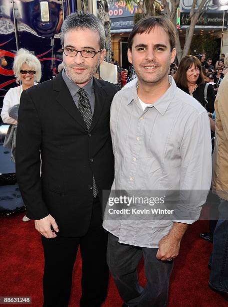 Writers Alex Kurtzman and Roberto Orci arrive at the premiere of Dreamworks' "Transformers: Revenge Of The Fallen" held at Mann Village Theatre on...