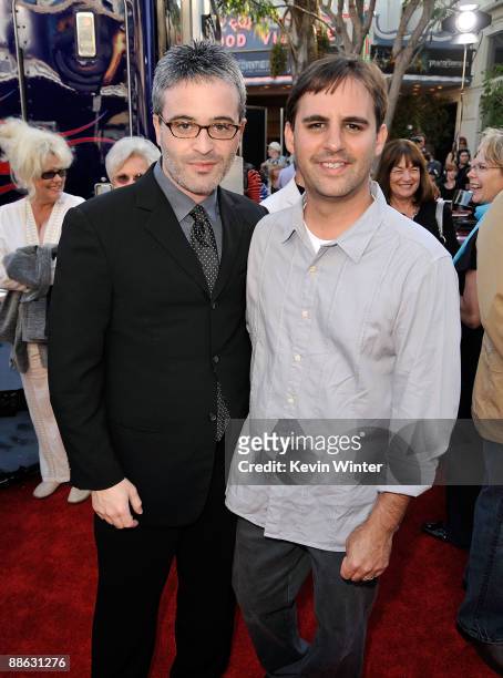 Writers Alex Kurtzman and Roberto Orci arrive at the premiere of Dreamworks' "Transformers: Revenge Of The Fallen" held at Mann Village Theatre on...