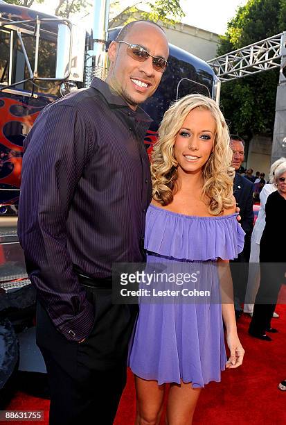 Personality Kendra Wilkinson and fiance Hank Baskett arrive on the red carpet of the 2009 Los Angeles Film Festival's premiere of "Transformers:...
