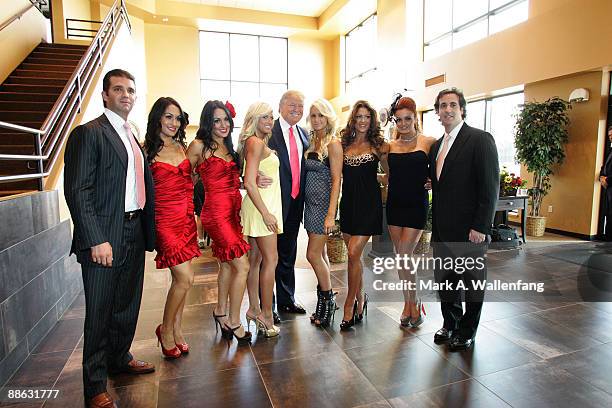 Donald Trump and the WWE DIVA girls attend a press conference about the WWE at the Austin Straubel International Airport on June 22, 2009 in Green...