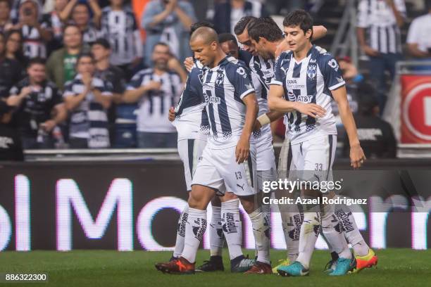 Rogelio Funes Mori of Monterrey celebrates with teammates after scoring his team's fourth goal during the semifinal second leg match between...