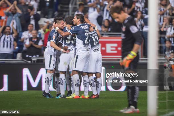 Rogelio Funes Mori of Monterrey celebrates with teammates after scoring his team's fourth goal during the semifinal second leg match between...