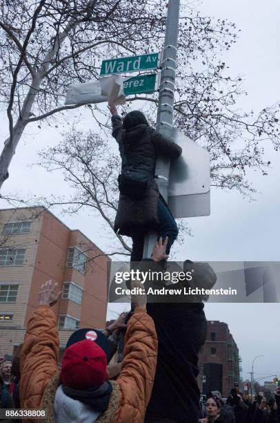 Friends, family and community activists attend the ceremonial street naming of Richie Perez Way on December 3, 2017 on 172nd street and Ward Avenue...