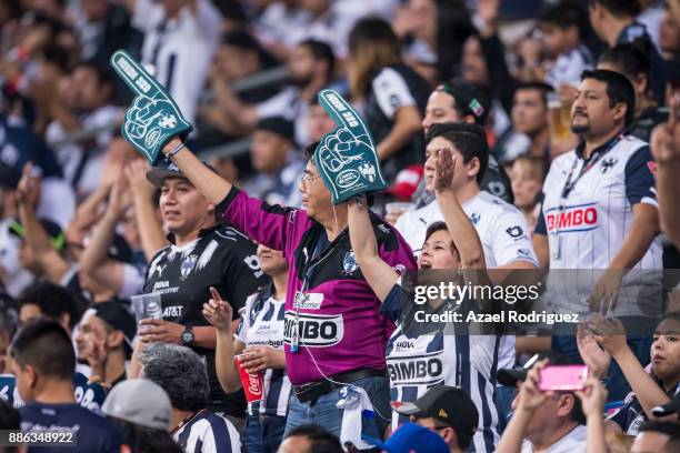 Fans of Monterrey cheer their team during the semifinal second leg match between Monterrey and Morelia as part of the Torneo Apertura 2017 Liga MX at...