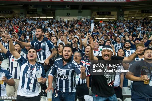 Fans of Monterrey cheer their team during the semifinal second leg match between Monterrey and Morelia as part of the Torneo Apertura 2017 Liga MX at...