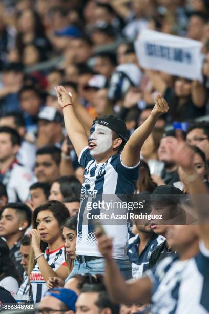 Fans of Monterrey cheer their team during the semifinal second leg match between Monterrey and Morelia as part of the Torneo Apertura 2017 Liga MX at...
