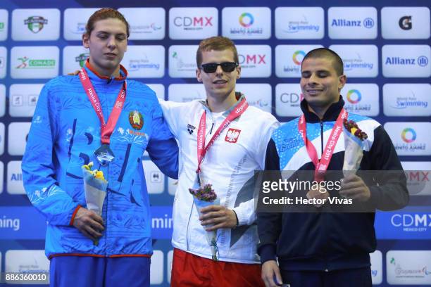 Hryhory Zudzilao of Belarus silver medal, Wojciech Makowski of Poland gold medal and Sergio Zayas of Argentina bronze medal in men's 100 m Backstroke...
