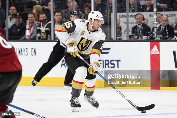 Stefan Matteau of the Vegas Golden Knights skates with the puck against the Arizona Coyotes during the game at T-Mobile Arena on December 3, 2017 in...