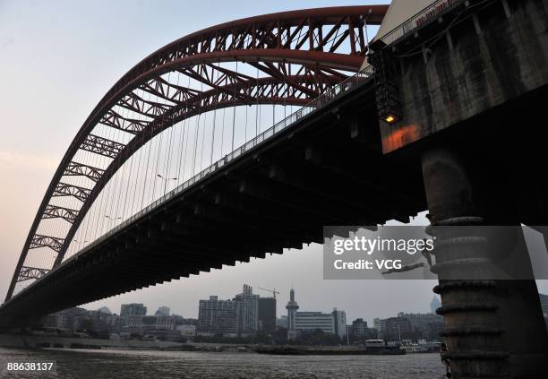 Boy jumps into the Hanjiang River to cool down on June 22, 2009 in Wuhan of Hubei Province, China. Wuhan is known as one of the "Three Furnaces" for...