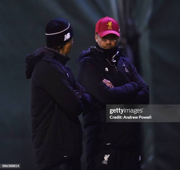 Jurgen Klopp manager of Liverpool with Zeljko Buvac first assistant coach of Liverpool during a training session at Melwood Training Ground on...