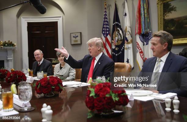 President Donald Trump speaks during a meeting with Republican members of Congress in the Roosevelt Room of the White House December 5, 2017 in...