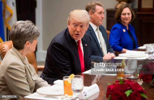 President Donald Trump speaks during a lunch meeting with Republican members of the Senate, including US Senator Joni Ernst , Republican of Iowa, US...