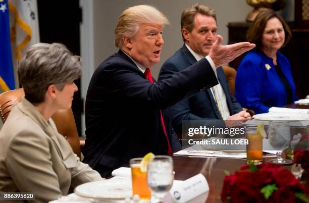 President Donald Trump speaks during a lunch meeting with Republican members of the Senate, including US Senator Joni Ernst , Republican of Iowa, US...