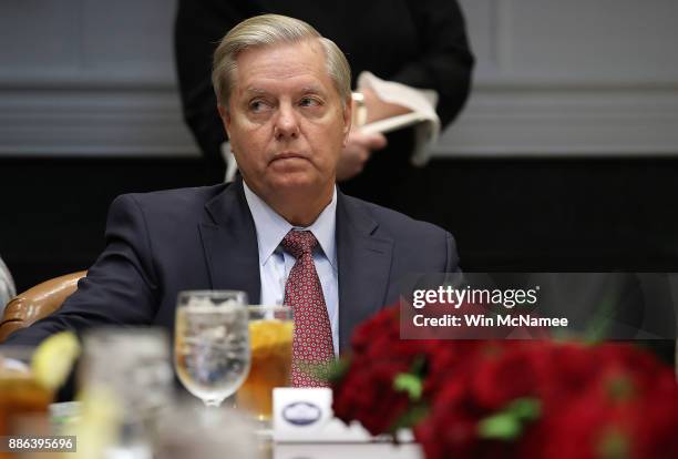 Sen. Lindsey Graham attends a meeting with U.S. President Donald Trump and Republican members of Congress in the Roosevelt Room of the White House...