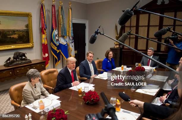 President Donald Trump speaks during a lunch meeting with Republican members of the Senate, including US Senator Joni Ernst , Republican of Iowa, US...