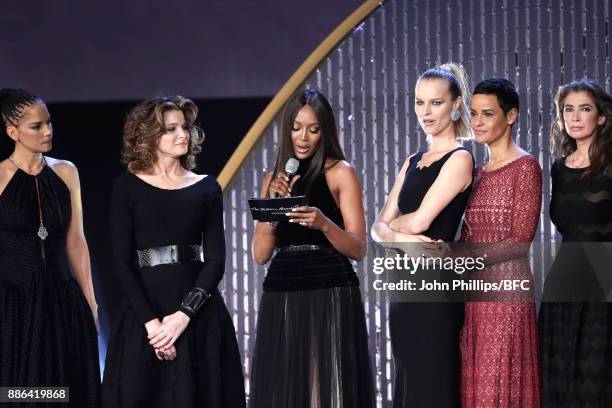 Veronica Webb, Stephanie Seymour, Naomi Campbell, Eva Herzegova, Nadege du Bospertus and a guest on stage during The Fashion Awards 2017 in...