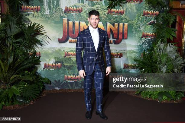 Nick Jonas attends "Jumanji : Welcome to the Jungle" Premiere at Le Grand Rex on December 5, 2017 in Paris, France.