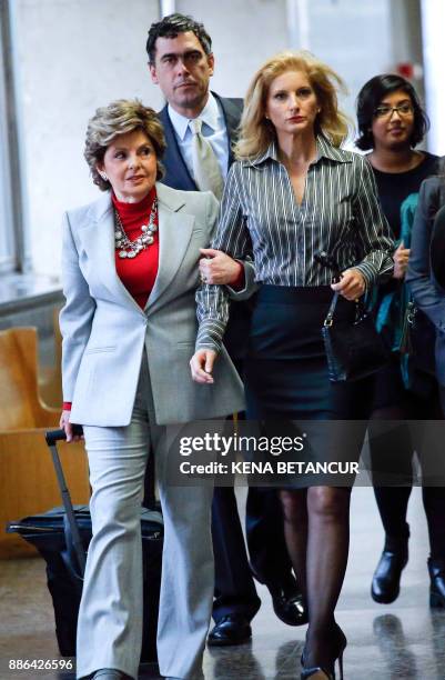 Summer Zervos, a former contestant on "The Apprentice" arrives with lawyer Gloria Allred at the New York County Criminal Court on December 5 in New...