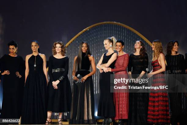 Farida Khelfa, Veronica Webb, Stephanie Seymour, Naomi Campbell, Eva Herzegova, Nadege du Bospertus, a guest and Yasmin Le Bon on stage during The...