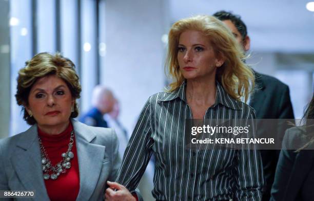 Summer Zervos, a former contestant on "The Apprentice" arrives with lawyer Gloria Allred at the New York County Criminal Court on December 5 in New...