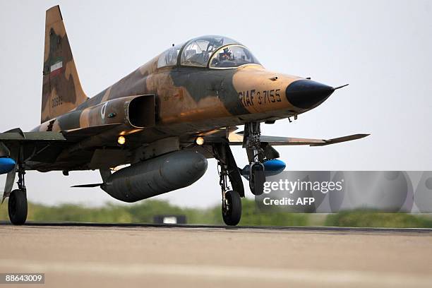 Iran's F-5 fighter jet lands in Chabahar city, south of Iran during a military exercise on June 23, 2009. Iran ruled out overturning its disputed...