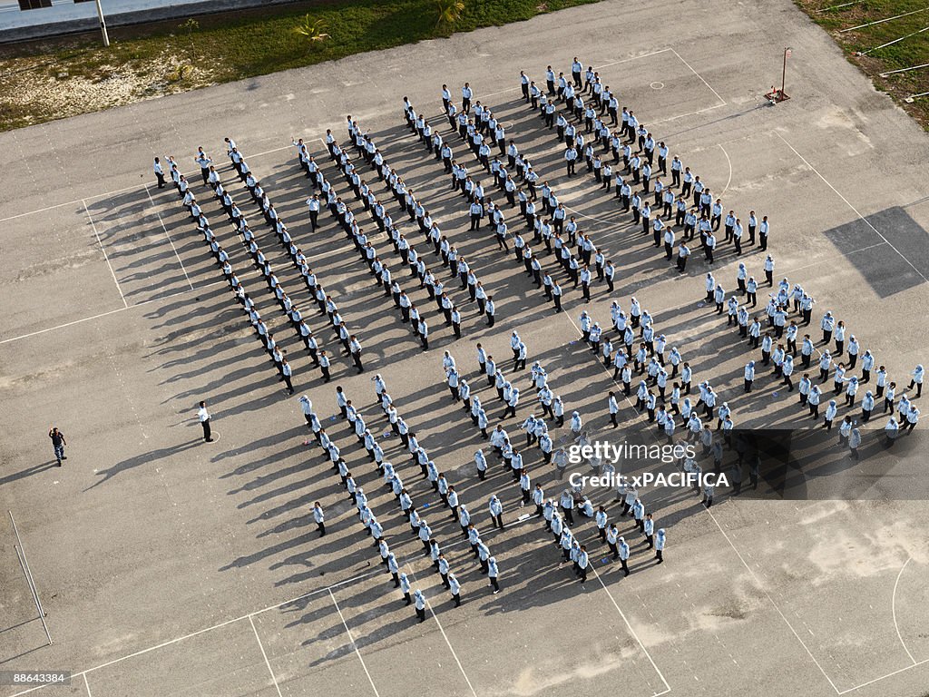 Students Lining Up Before Class Outside Of A Schoo High-Res Stock Photo ...