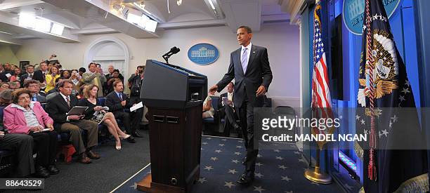 President Barack Obama walks to the lectern for a press conference June 23, 2009 in the Brady Briefing Room of the White House in Washington, DC. AFP...