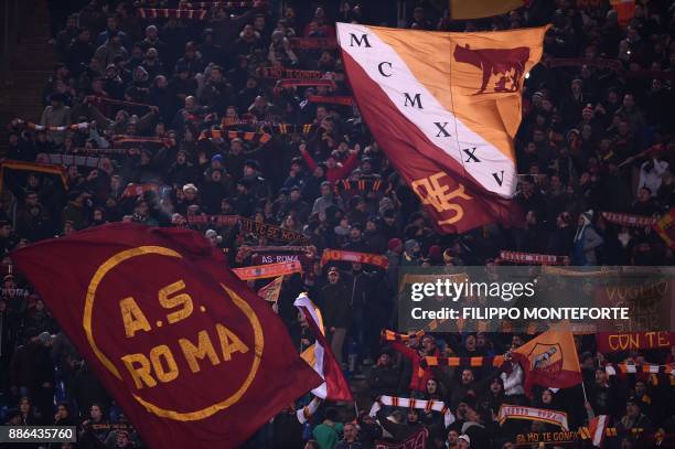 Roma's fans cheer during the UEFA Champions League Group C football match AS Roma vs FK Qarabag on December 5, 2017 at the Olympic stadium in Rome. /...