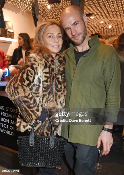 Jeanne Marine and Cameron Saul attend the opening of the BOTTLETOP flagship store on Regent Street on December 5, 2017 in London, England.