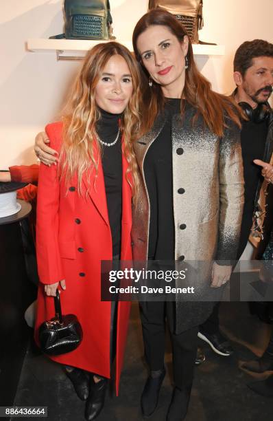 Miroslava Duma and Livia Firth attend the opening of the BOTTLETOP flagship store on Regent Street on December 5, 2017 in London, England.