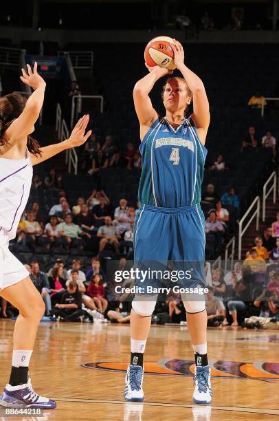 Christi Thomas of the Minnesota Lynx shoots the ball during the WNBA game against the Phoenix Mercury on June 17, 2009 at US Airways Center in...