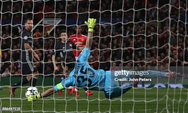 Marcus Rashford of Manchester United has a shot saved by Igor Akinfeev of CSKA Moscow during the UEFA Champions League group A match between...