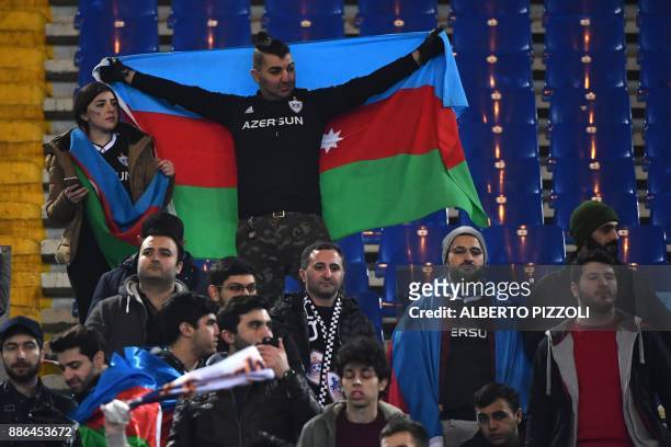 Qarabag's fans wait for the start of the UEFA Champions League Group C football match AS Roma vs FK Qarabag on December 5, 2017 at the Olympic...