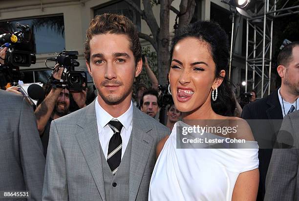 Actor Shia LaBeouf and actress Megan Fox arrive on the red carpet of the 2009 Los Angeles Film Festival's premiere of "Transformers: Revenge of the...