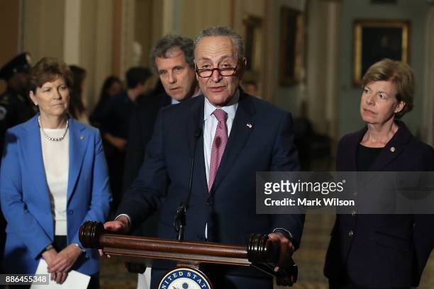 Senate Minority Leader Charles Schumer speaks to reporters about the tax reform bill the Senate passed last week, and the possibility of a Government...