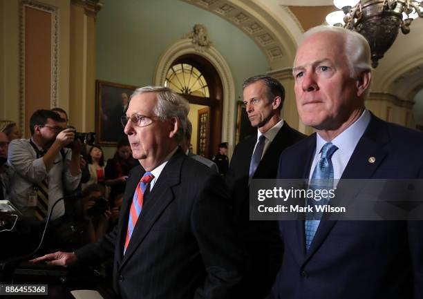 Senate Majority Leader Mitch McConnell , speaks to reporters about the tax reform bill the Senate passed last week, at US Capitol on December 5, 2017...