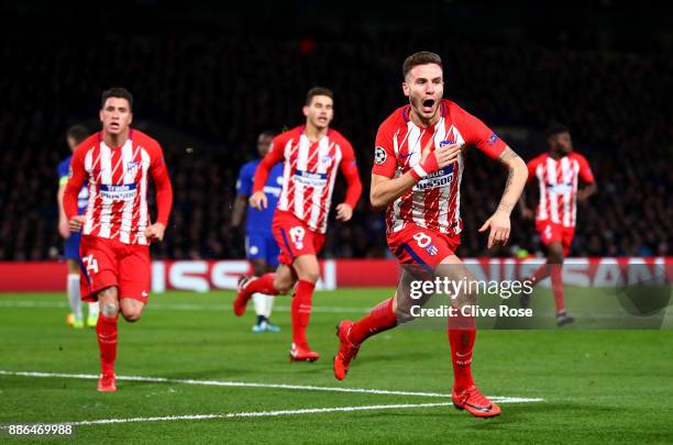 Saul Niguez of Atletico Madrid celebrates after scoring his sides first goal during the UEFA Champions League group C match between Chelsea FC and...