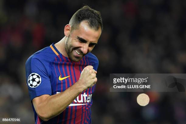 Barcelona's Spanish forward Paco Alcacer celebrates after scoring a goal during the UEFA Champions League football match FC Barcelona vs Sporting CP...