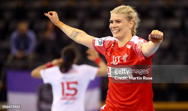 Kathrine Heindahl of Denmark celebrates after scoring a goal during the IHF Women's Handball World Championship group C match between Denmark and...