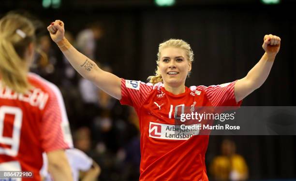 Kathrine Heindahl of Denmark celebrates after scoring a goal during the IHF Women's Handball World Championship group C match between Denmark and...