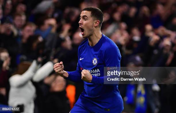 Eden Hazard of Chelsea celebrates after his shot was deflected in by Stefan Savic of Atletico Madrid for Chelsea's first goal during the UEFA...