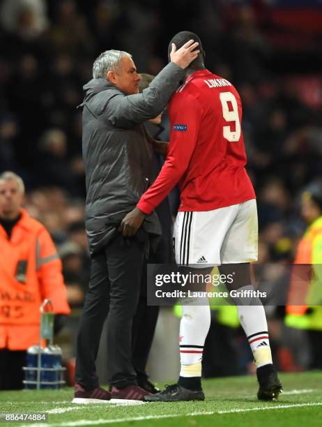 Romelu Lukaku of Manchester United embraces Jose Mourinho, Manager of Manchester United after being subbed during the UEFA Champions League group A...