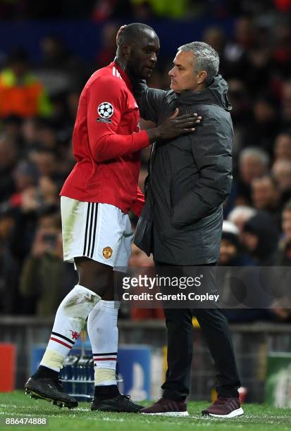 Romelu Lukaku of Manchester United embraces Jose Mourinho, Manager of Manchester United after being subbed during the UEFA Champions League group A...