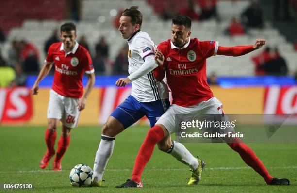 Basel midfielder Luca Zuffi from Switzerland with SL Benfica midfielder Andreas Samaris from Greece in action during the UEFA Champions League match...