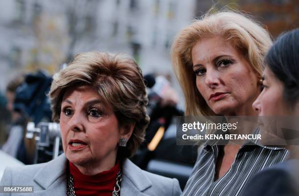 Summer Zervos a former contestant on The Apprentice" looks at the camera as she stands with lawyer Gloria Allred after they leave the New York County...